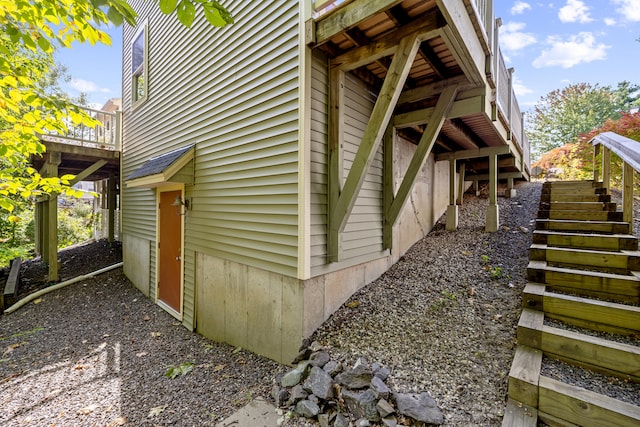 view of property exterior with stairs