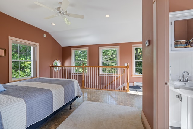 bedroom with lofted ceiling, baseboard heating, a ceiling fan, and recessed lighting