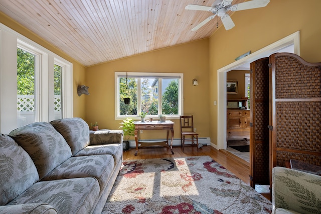 living room featuring baseboards, lofted ceiling, a baseboard radiator, wood ceiling, and wood finished floors