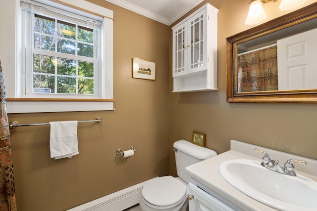 bathroom with baseboard heating, crown molding, vanity, and toilet