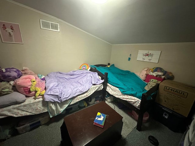 bedroom featuring carpet floors and lofted ceiling