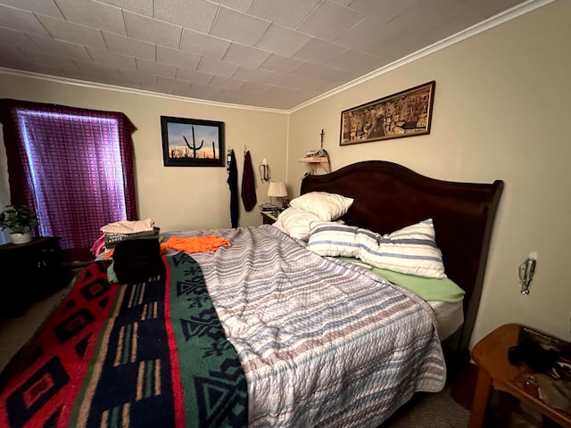 bedroom with carpet and crown molding