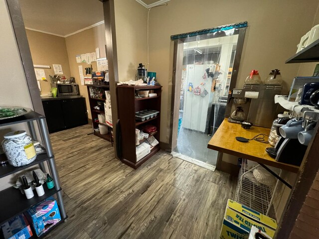 office area featuring ornamental molding and wood-type flooring