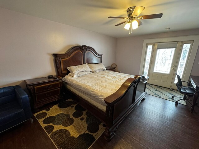 bedroom with ceiling fan and dark hardwood / wood-style flooring