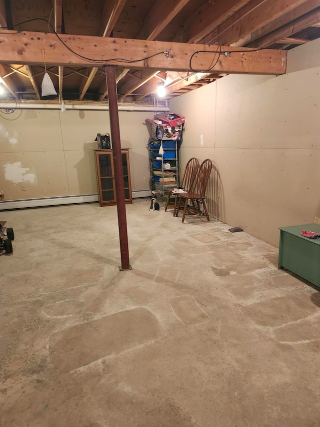 basement with a baseboard heating unit