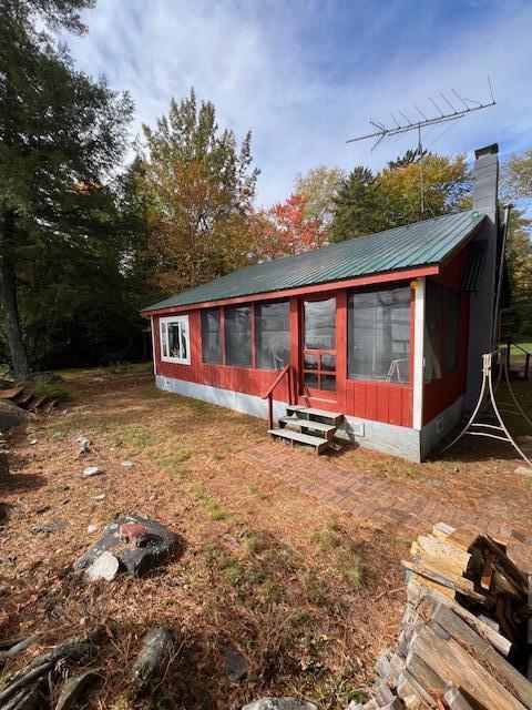 view of outbuilding with entry steps