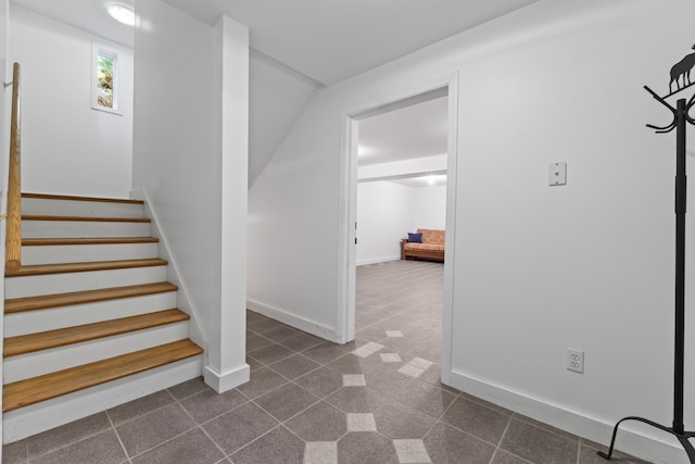 96 Bunker Hill Rd, Newcastle, ME 04553 - stairway with baseboards and tile patterned floors