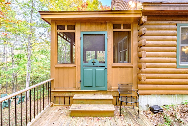 doorway to property with a deck