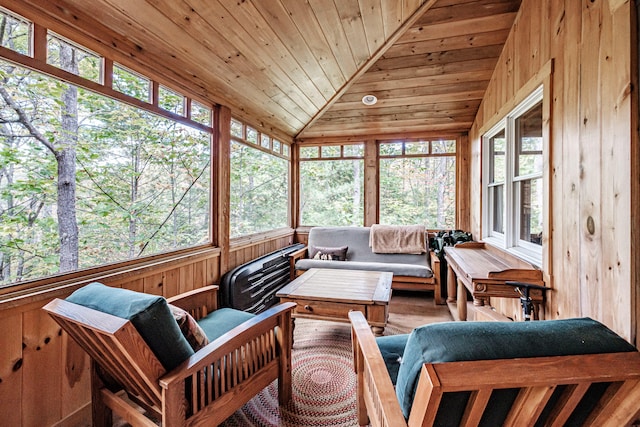 sunroom / solarium with wooden ceiling and vaulted ceiling