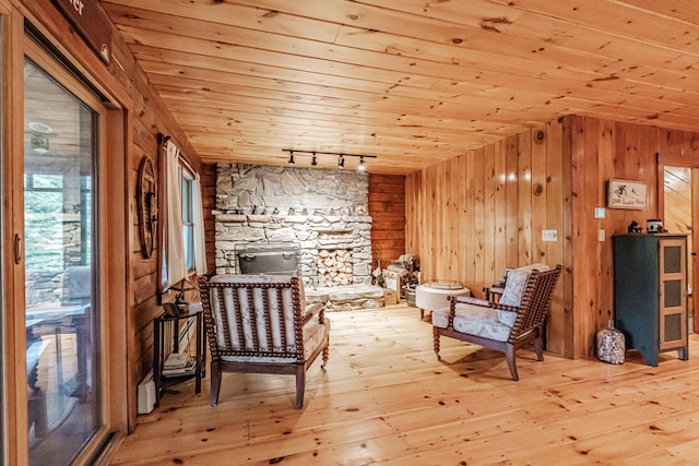 11 Goss Pond Rd, Bethel, ME 04217 - unfurnished room featuring wooden ceiling, rail lighting, wood-type flooring, and wooden walls
