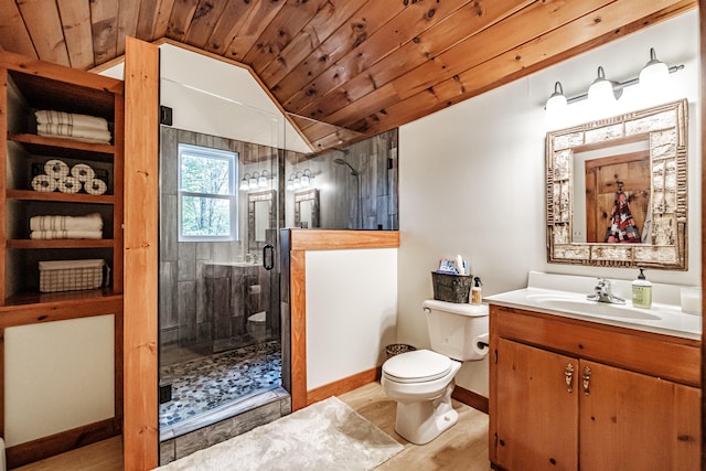 bathroom featuring wood ceiling, vaulted ceiling, walk in shower, vanity, and toilet