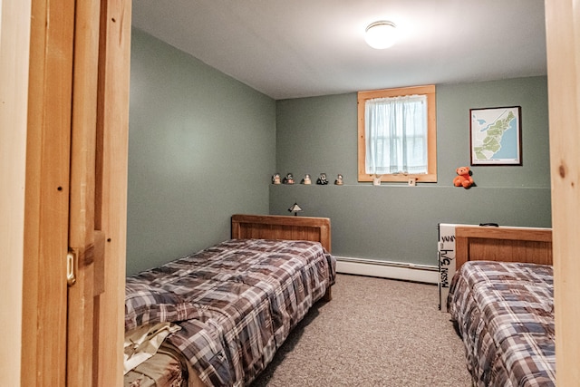 carpeted bedroom featuring a closet and a baseboard radiator