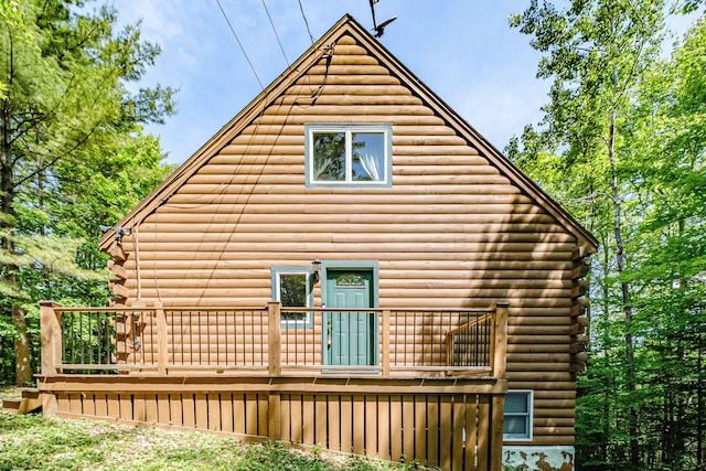 11 Goss Pond Rd, Bethel, ME 04217 - view of side of property with a deck and log siding