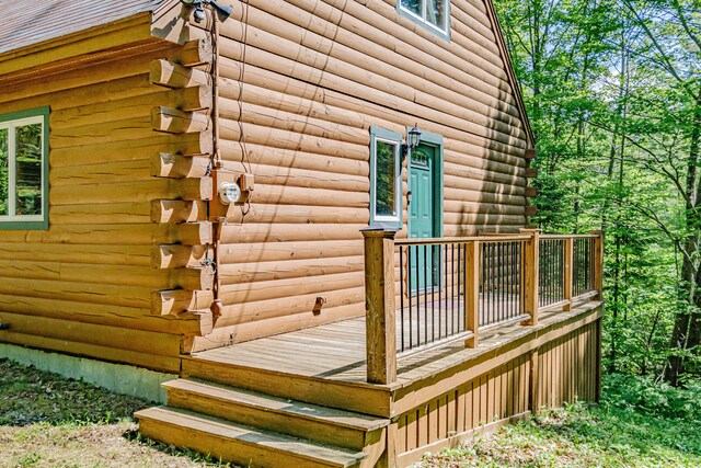 11 Goss Pond Rd, Bethel, ME 04217 - view of home's exterior with log siding