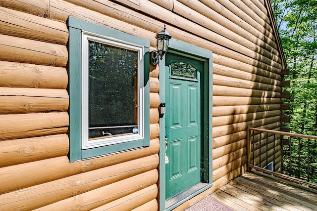 11 Goss Pond Rd, Bethel, ME 04217 - view of exterior entry featuring log veneer siding