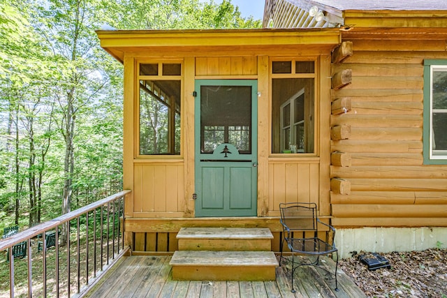 11 Goss Pond Rd, Bethel, ME 04217 - view of exterior entry with log siding