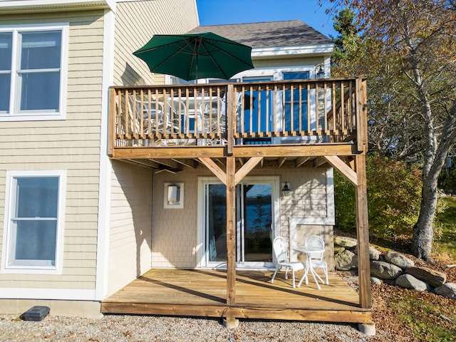 rear view of property with a deck