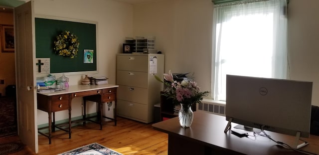 office area with light hardwood / wood-style flooring