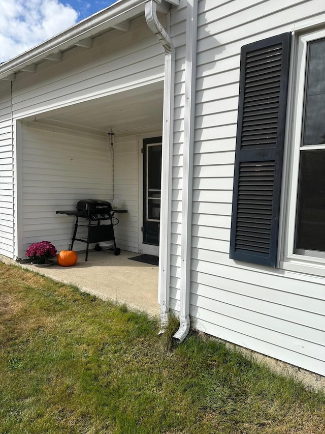 view of home's exterior featuring a yard