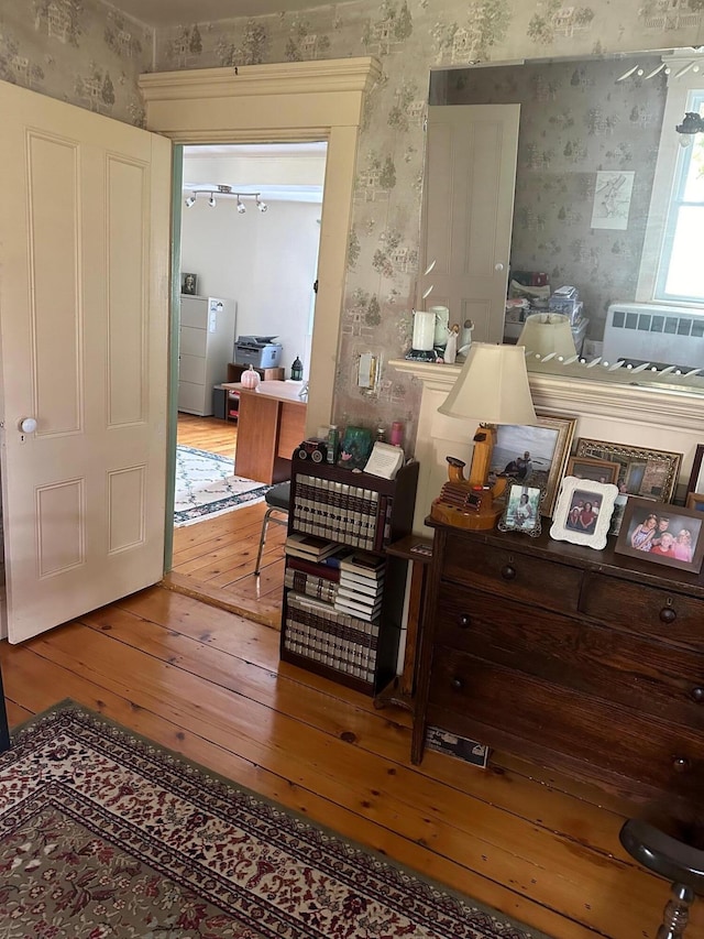 interior space with hardwood / wood-style floors