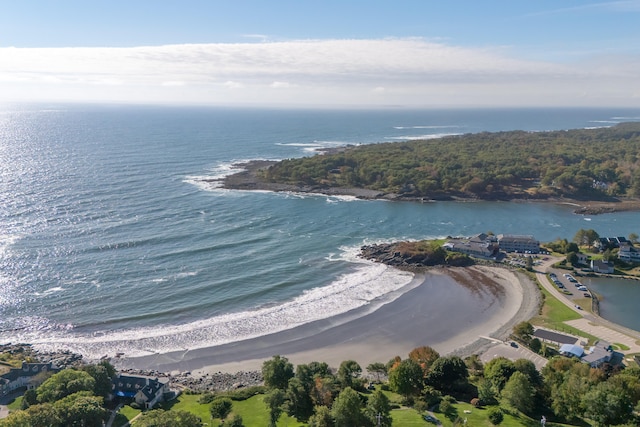 birds eye view of property featuring a view of the beach and a water view