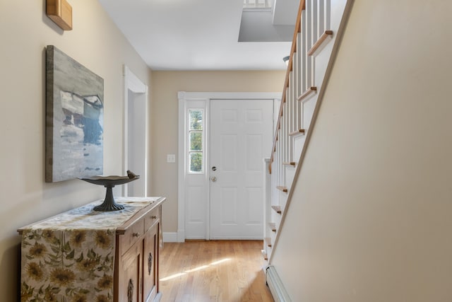 entrance foyer with light wood-type flooring