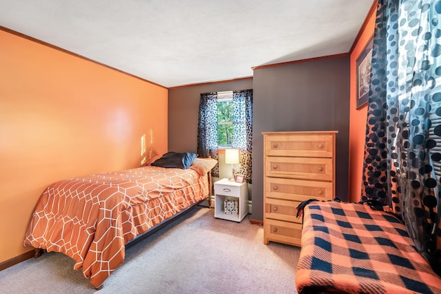 carpeted bedroom with crown molding