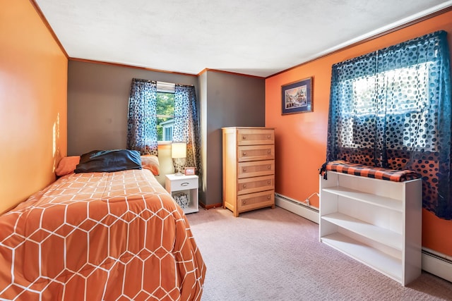 bedroom with a textured ceiling, crown molding, carpet flooring, and a baseboard heating unit