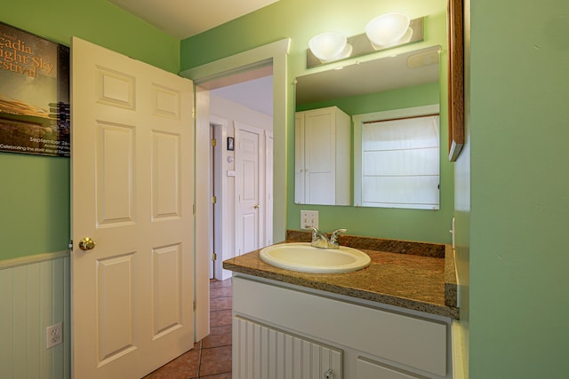 bathroom with vanity and tile patterned floors