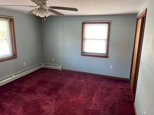 unfurnished room featuring dark colored carpet and ceiling fan