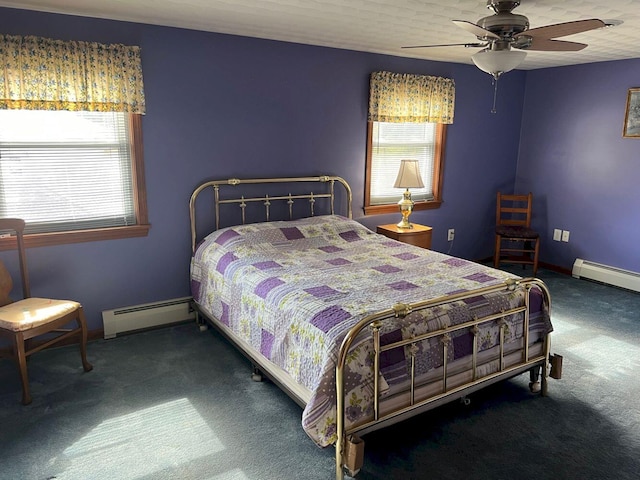 carpeted bedroom featuring ceiling fan and a baseboard radiator