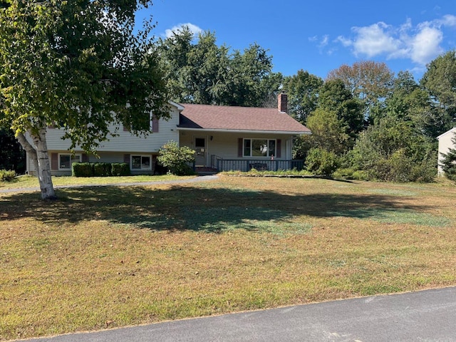 split level home with a front yard