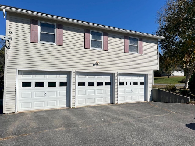 exterior space featuring a garage