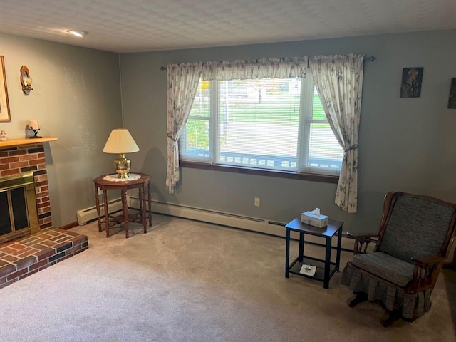 living area with carpet flooring and a fireplace