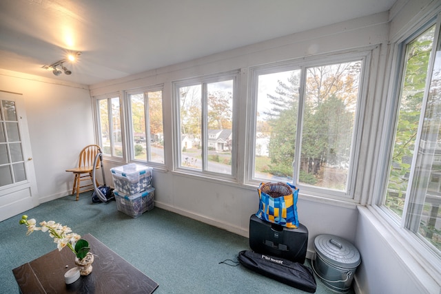 sunroom featuring a wealth of natural light