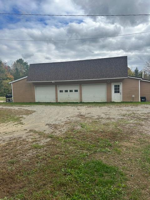 473 Wolfboro Rd, Stetson, ME 04488 - detached garage with dirt driveway