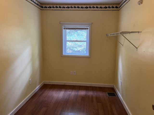 473 Wolfboro Rd, Stetson, ME 04488 - walk in closet with dark wood finished floors and visible vents
