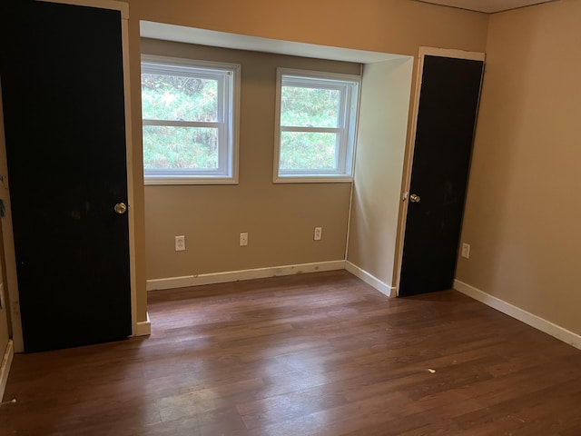 473 Wolfboro Rd, Stetson, ME 04488 - empty room with baseboards and wood finished floors
