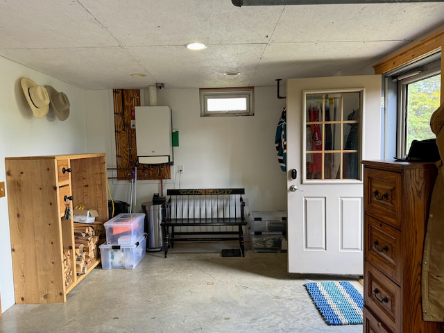 basement featuring water heater