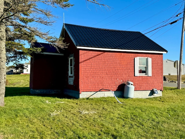 view of home's exterior featuring a lawn