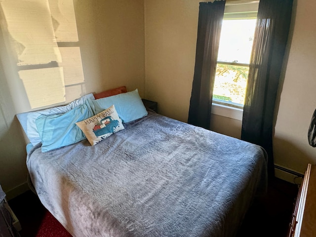 bedroom with a baseboard radiator