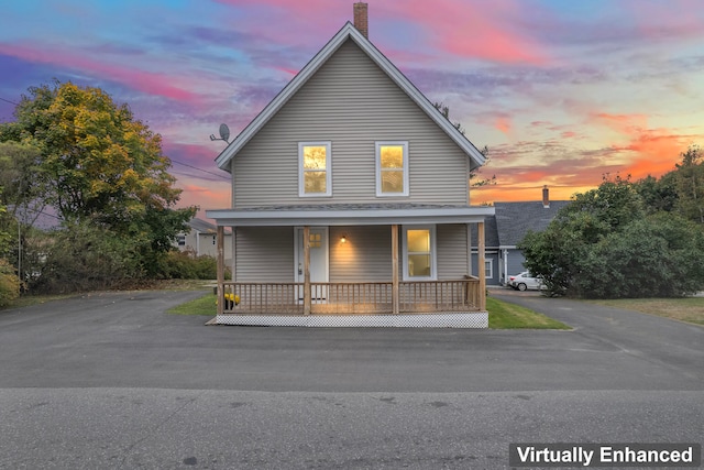 view of front of property featuring covered porch