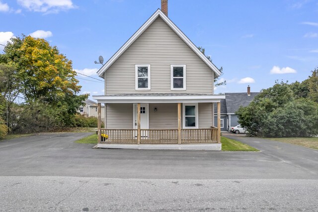 5 Harbor Rd, Friendship, ME 04547 - view of front of house with covered porch and a chimney