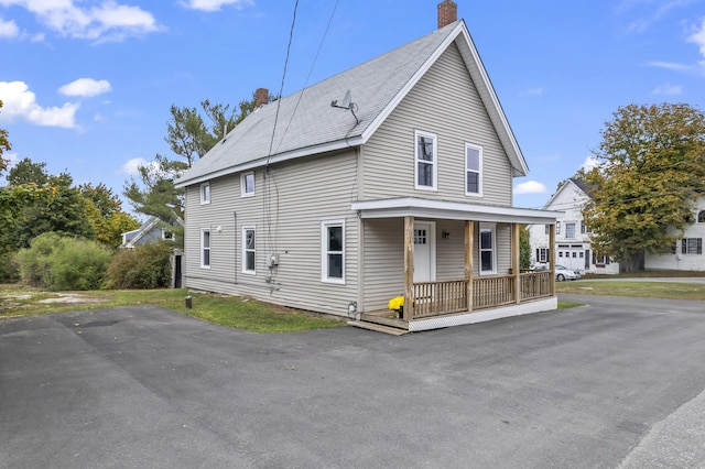 5 Harbor Rd, Friendship, ME 04547 - view of front of home with covered porch and a chimney