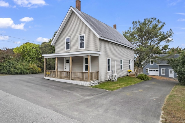 5 Harbor Rd, Friendship, ME 04547 - view of front facade with a chimney and covered porch