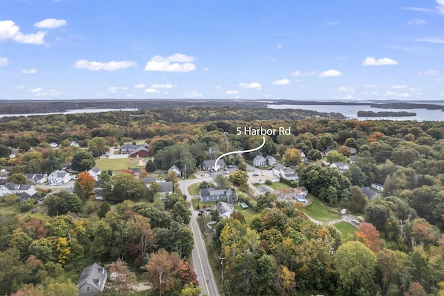 5 Harbor Rd, Friendship, ME 04547 - aerial view of property and surrounding area with a large body of water, a heavily wooded area, and nearby suburban area