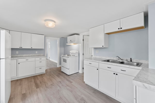 kitchen with light hardwood / wood-style flooring, white cabinets, white appliances, and sink