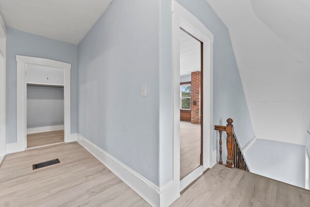 hall with light wood-type flooring