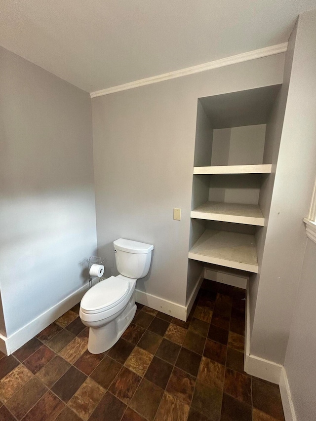 bathroom featuring toilet