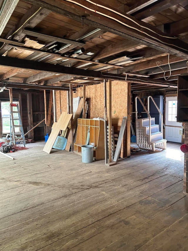 interior space featuring wood ceiling and hardwood / wood-style floors